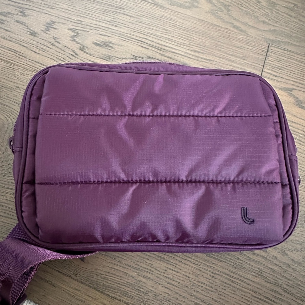 Purple lole belt bag with hand warmer
